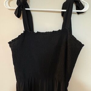 Black bow romper with tie straps that turn into cute bows! 🎀